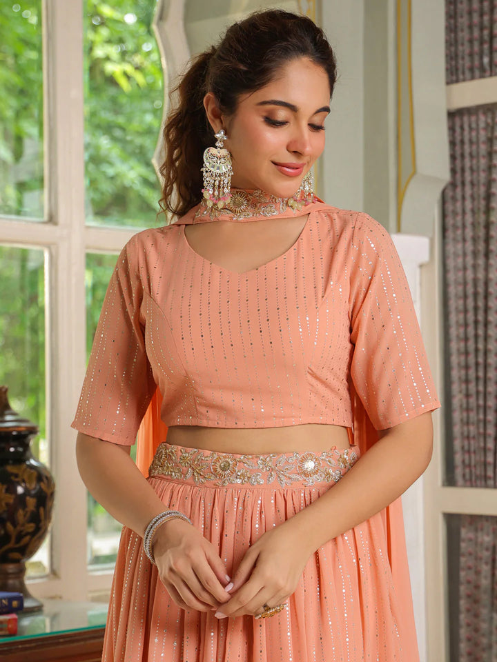 Peach Georgette Lehenga Choli Set with Foil Prints and Embellishments