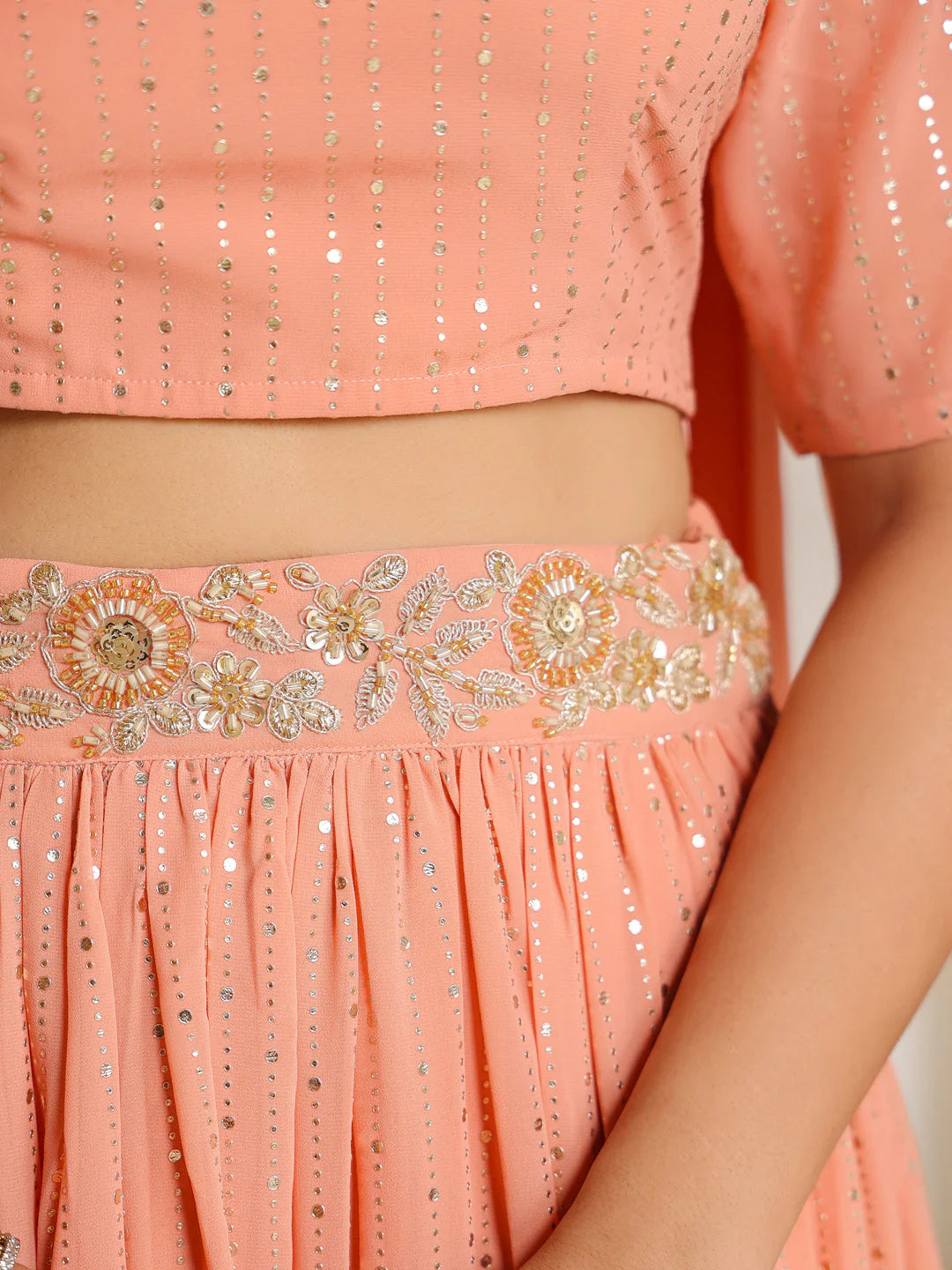 Peach Georgette Lehenga Choli Set with Foil Prints and Embellishments